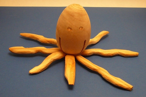 Carved Octopus
My 11-year old son carved this for a school project.  The body is a craft-store wooden egg.  There are saw kerfs in it because I sawed them to fit fins for a rocket-toons project.
Keywords: carving