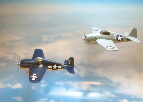 Formation of Two Hellcats in flight
