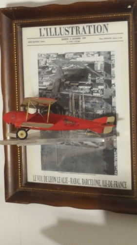 Finished plane on display 2
Glued clear plastic on picture frame glass.  Like it's flying right out of the magazine cover.
Keywords: Morane, Saulnier, BB, wooden, model, 1/48th, scale, hand, carved,