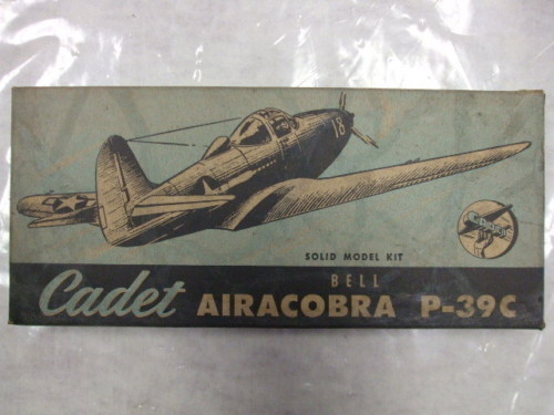Bell P-39C Cadet kit box
(jpg format, - dpi, 43 KB).

Link to file: [url]http://smm.solidmodelmemories.net/Gallery/albums/userpics/-[/url]

[i]These plans are placed here in review of their accuracy and historical content. They are for personal use only and not to be reproduced commercially. Copyrights remain with the original copyright holders and are not the property of Solid Model Memories. Please post comment regarding the accuracy of the drawings in the section provided on the individual page of the plan you are reviewing. If you build this model or if you have images of the original subject itself, please let us know. If you are the copyright holder of the work in question and wish to have it removed please contact SMM [/i]

Keywords: Bell P-39C Cadet kit box