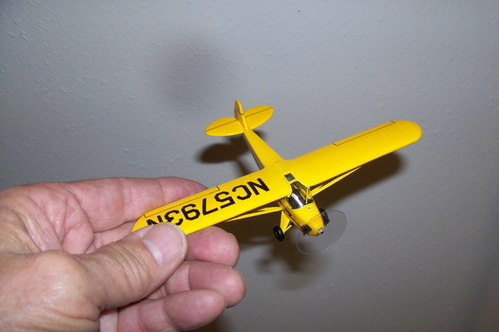1946 Piper J-3 Cub  built in 2010
There is no plastic kit for the J-3 Cub in 1/72 scale. This is scratchbuilt from balsa using brushed on Aero Gloss dope paint. Vacuum-formed canopy, seated figure inside. 
