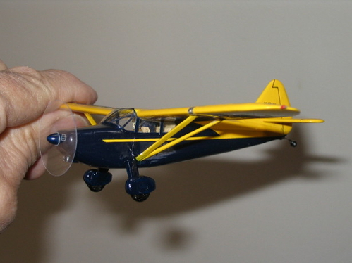 1946 Stinson 108  1/72 scale
I built this model to replicate an aircraft owned by a good friend and in which I had many enjoyable flying hours. It is carved from balsa with vacuum-formed wheel pants and canopy. Aero Gloss dope paints were brushed on.
