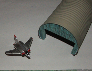 New 1/144 hangar from soup can
2/3 of a soup can, a bit of wood and some printed patern make a nifty hangar for small aircraft. Larger can can be used for larger scales.
Keywords: smm solidmodelmemories 1/144 hangar