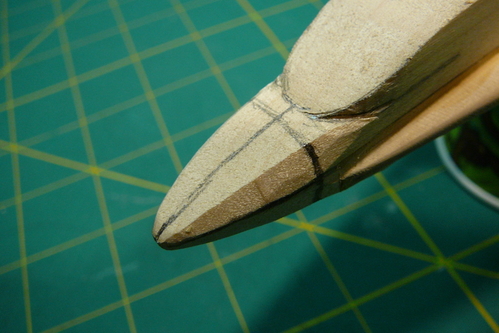 16. Ascender nose
Starting to carve the nose to shape.  I block in the shape with straight cuts, first boxing in the outline with a four-sided figure, then dividing this into eight sides.
Keywords: bristol spaceplane ascender model