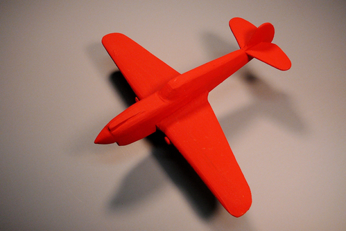 Semi-scale P-40 (1/72)
Here is Benjamin's P-40, which he painted bright red (he's four years old). I made this very quickly. It is mostly to scale, but certainly not completely accurate. Brendan helped to shape the fuselage. 
Keywords: solid semi-scale model airplane P-40
