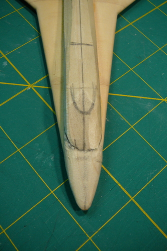 19.  Cockpit top
I sketched in the curve of the top of the cabin and started to carve from this curve to the curve defining the bottom of the windscreen.
Keywords: bristol spaceplane ascender model