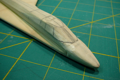 21. Cabin rough-carved
The cabin rough-carving is complete.  Notice how the rounded after portion of the fuselage makes that portion look like it is flowing into the wing.  Again, this was very clear from 3D illustrations of the Ascender, but you wouldn't know that just from the 3-view.  Always make sure to use mulitple sources!
Keywords: bristol spaceplane ascender model