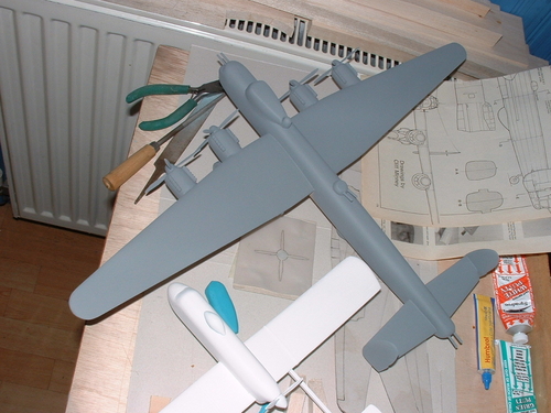 First coats of grey auto primer and a spell of warm weather to assist the Avro Lincoln progress.
Keywords: solid models,carved aeroplanes,vintage model building,balsa wood models,scale models scratchbuilt