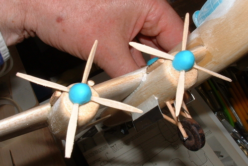 Sixteen blades into FIMO hubs,an undercarriage from barbecue spears and doors from a bean can help the Avro Lincoln take shape.
Keywords: solid models,carved aeroplanes,vintage model building,balsa wood models,scale models scratchbuilt Avro Lincoln