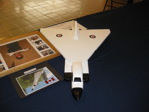 Public showing 25 Apr 09
An 11 year old made this solid scratchbuilt Avro Arrow in somewhat stand-off scale. A very good effort.
Keywords: SMM hand carved solid wood scale model ship aircraft