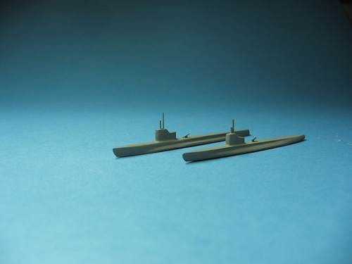 Perch Class Submarine in 1/1200 scale
The far subject was constructed using pine instead of mahogany. The grain of the wood was much easier to fill.
Keywords: SMM Hand Craved Solid Wood Scale Model Perch Class Submarine 1/1200