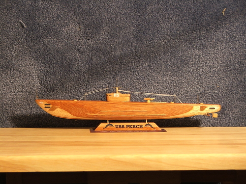 USS Perch
Approx 1/300 scale made from USS Perch plans by Comet Models. Hull is laminated recycled light and dark mahogany baseboards.
