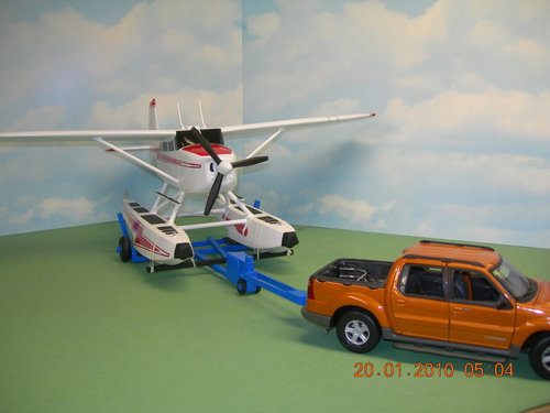 Cessna 185 
1/18 scale on float with metal car models
