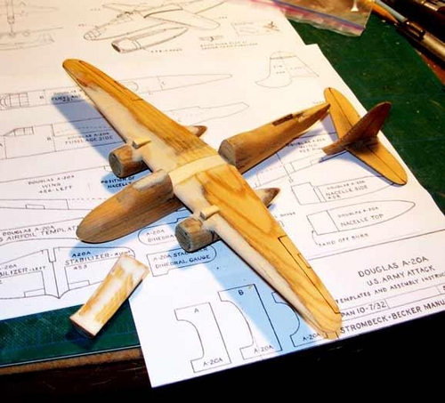 Doxaerie's A-20
Here parts have been restored to original configuration and movable surfaces woodburned in
Keywords: SMM Solid Model Memories Wood Carved Aircraft