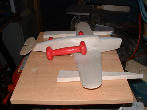 FAIREY PRIMER TRAINER
A new use for those weight lifting dumbells that were an unwanted gift,the Fairey Primer has its wings fitted.
MAY 2010 BUILD.
Keywords: FAIREY PRIMER,Solid models,carving models in wood,Solid model memories,old time model building,nostalgic model building