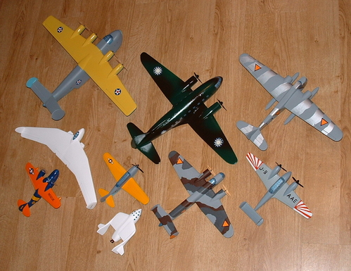 The completed Fokker T-4 nestles amongst a batch of completed solids.
Keywords: Fokker T-5 BOMBER,FOKKER T-4 SEAPLANE,Solid Model Memories,balsa wood,wooden models,carving.
