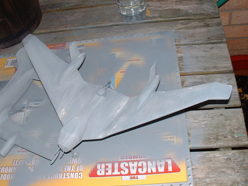 Luftwaffe Flying wing gets its primer coats.
Keywords: RAIDERS OF THE LOST ARK FLYING WING,Solid models,carving models in wood,Solid model memories,old time model building,nostalgic model building