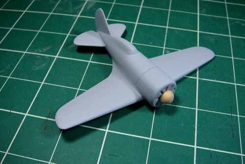 I-16 with spinner added
The whole plane has been primed.  I turned the spinner from a dowel in a drill press.  I just need to scribe part of the main gear doors and add a tailwheel, and then I'll be ready to paint.
