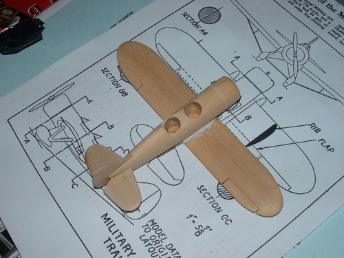 The Lackner military trainer has had the wings and tail fitted.
Keywords: solid models,wooden models,balsawood,model building Lackner trainer