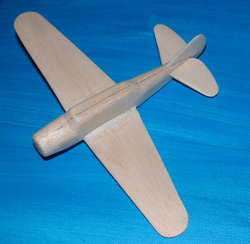 Noth American NA.47 assembled
The mid wing layout always presents a challenge for us,my way is to slice out the area carefully,remove the area where the wing goes and then replace the stub,with care you can work down to the level with the fuselage.
Keywords: solid models,wooden models,balsawood,model building