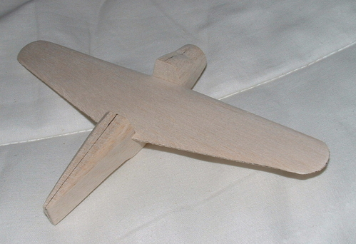 North American NA.47
The wing is placed within the cut out prior to replacing the plug on the NA.47.
Keywords: solid models,wooden models,balsawood,model building