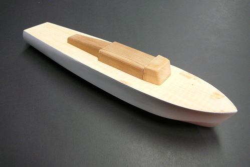 PT-9 hull with cabin
The main parts of the PT-9 model.  The hull is spruce salvaged from pieces a local house contractor gave me.  The cabin parts are western red cedar.
Keywords: torpedo boat PT-9 solid model ship