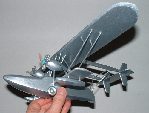 Sikorsky S-38 Amphibian
Silver paint added today,engines and propellers mounted as well.
Keywords: SIKORSY S-38 EXPLORERS YACHT,Solid models,carving models in wood,Solid model memories,old time model building,nostalgic model building