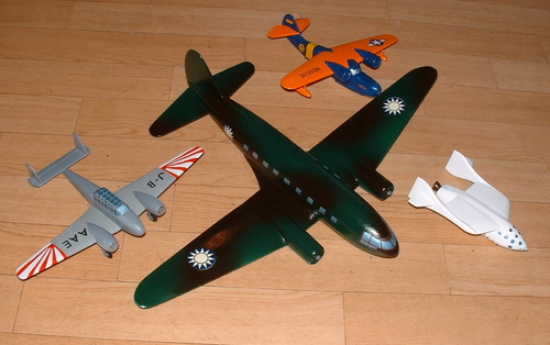 Spaceship One poses with a C-46 Commando,a Grumman Goose,Otori Jap twin.
Keywords: SPACESHIP ONE,RICHARD BRANSON,Solid models,wooden models,carving,balsa wood,model aircraft,solid model memories