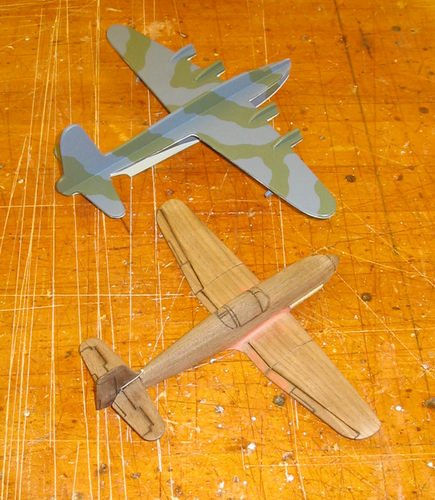 Work in Progress 1
My Sunderland and a Heinkel 100/113 from the old US Navy plan set.  Wood bunrt detail lines.
