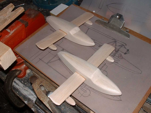 Sikorsky S-38 Amphibian
Lower wings have been added to the fuselage via the brass rod support spars.
Keywords: SIKORSY S-38 EXPLORERS YACHT,Solid models,carving models in wood,Solid model memories,old time model building,nostalgic model building